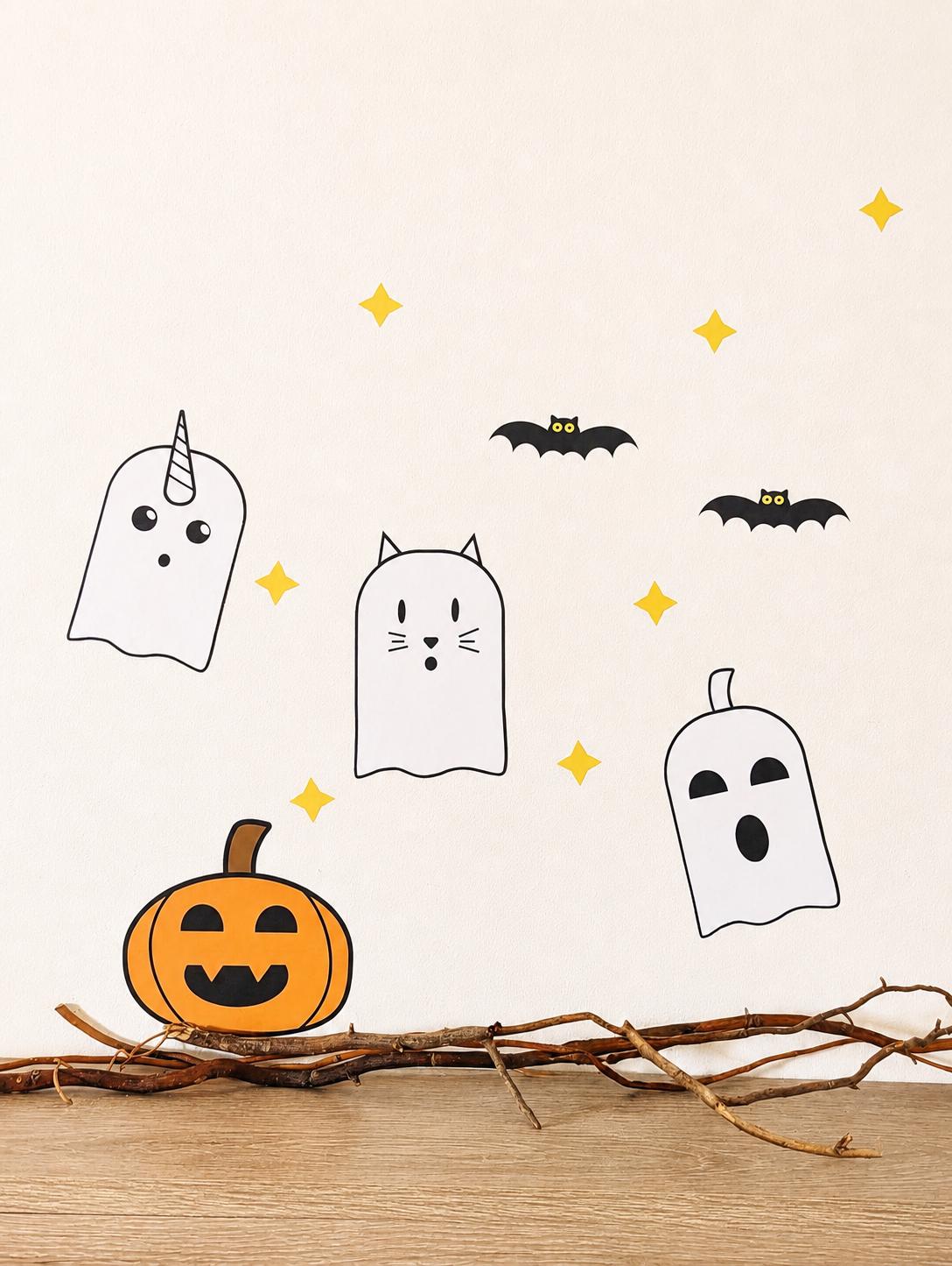 Ghost, bat and moon wall decals on a wall