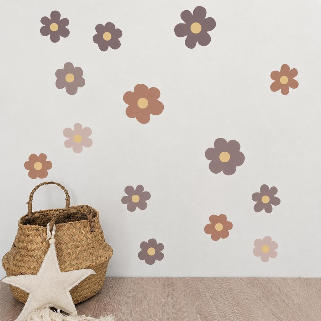 Brown flower wall decals scattered across a wall