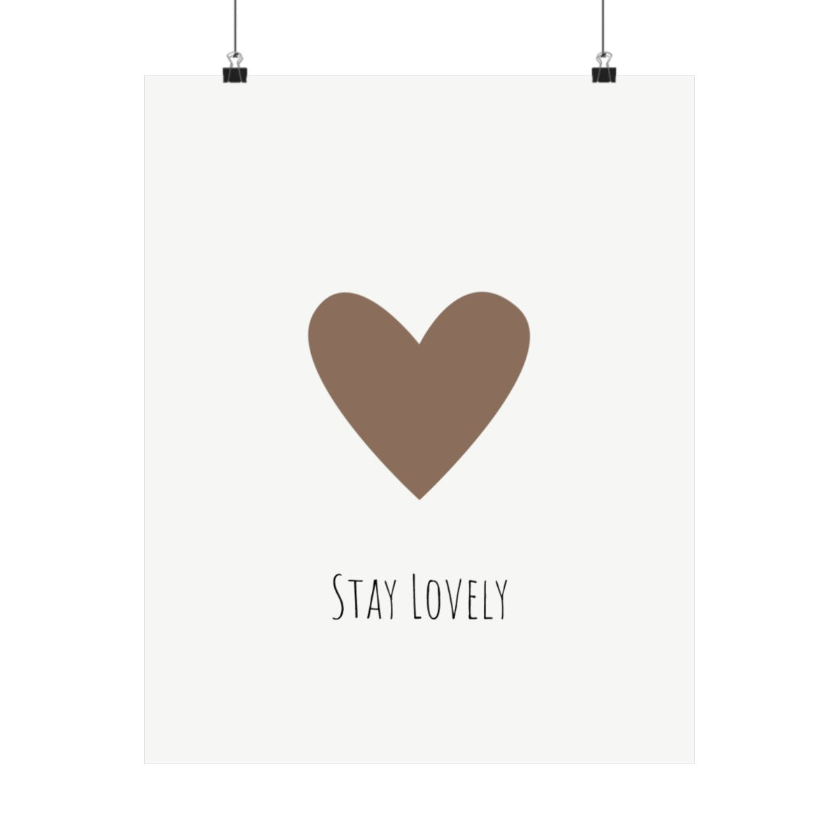 Stay Lovely brown heart poster on a wall